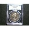 1958  $1  PCGS MS65.  Superb toning over full und