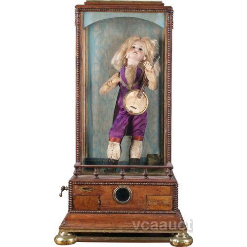 Coin Operated Boy Banjo Player Automaton