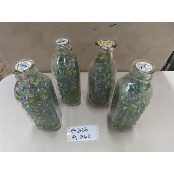 4 Milk Bottles FDull of Marbles