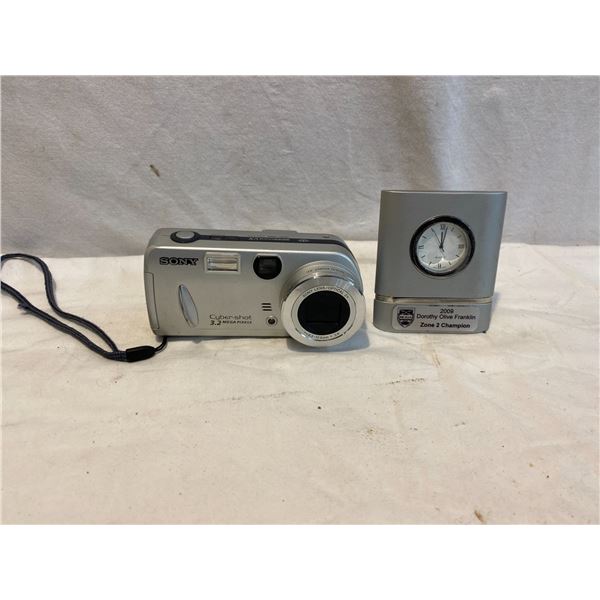 Sony cyber shot camera and clock