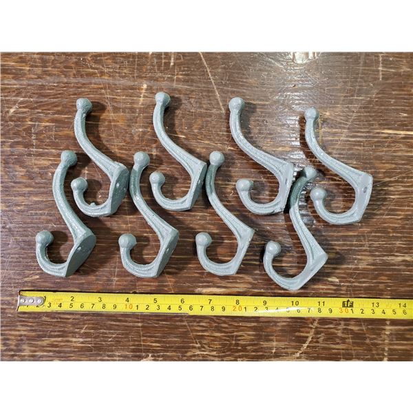 eight 3.5" iron coat hooks