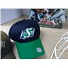 Image 3 : 2 new official Roughriders hats, coffee table book and hat washer