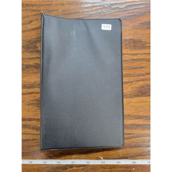 Small 3-ring binder for housing paper money. Used.