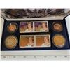 Image 3 : 1953 – 2003 Queen Elizabeth II Coronation Coin & Stamp Set. Includes 4 Canadian coins and 4 differen