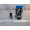 Image 1 : 240. Jar of marbles and mini marbles in cream bottle