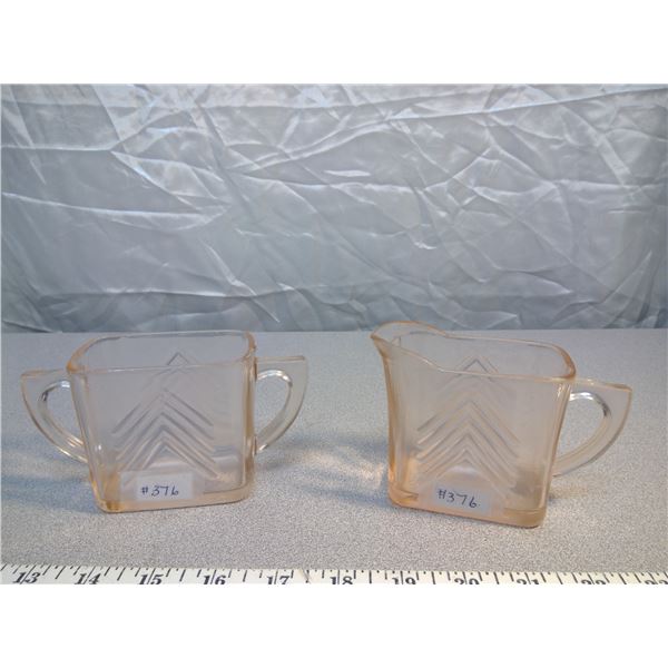 376. Pink Depression glass cream and sugar with chevron pattern