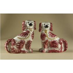 PAIR OF STAFFORDSHIRE SEATED SPANIELS BURGANDY