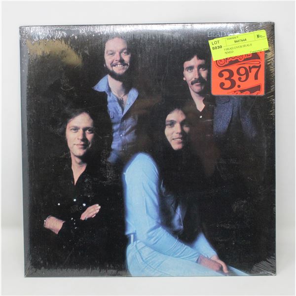 POCO HEAD OVER HEALS UNOPENED