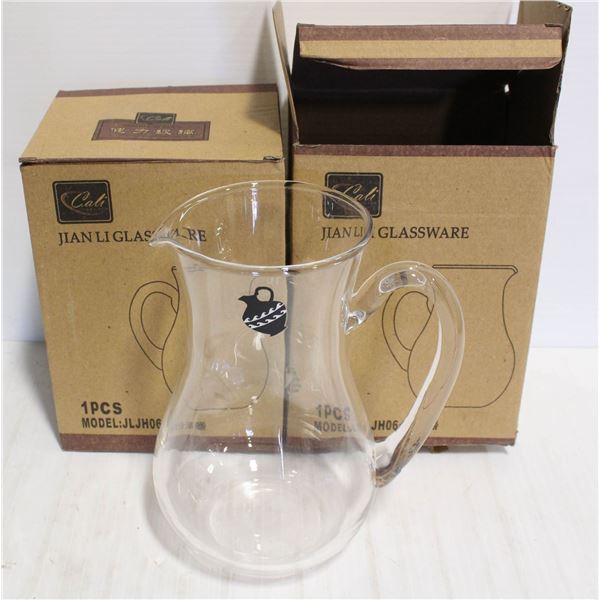 LOT OF TWO GLASS PITCHERS