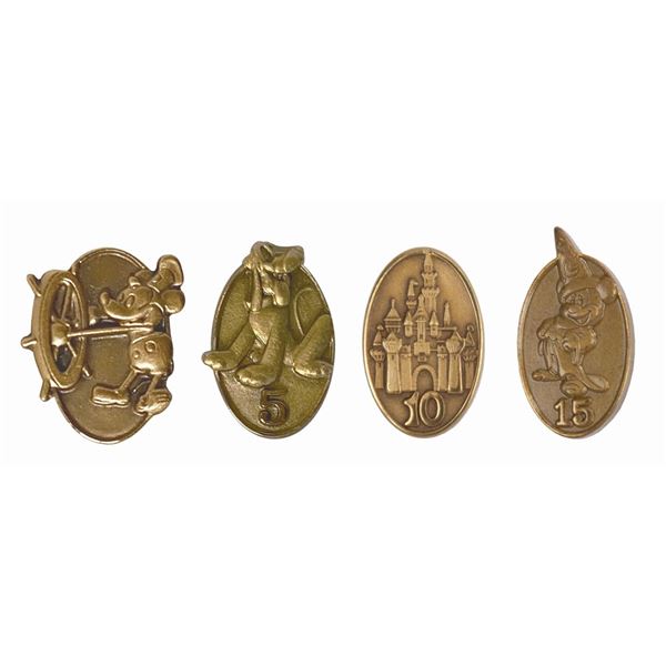 Set of (4) Cast Member Service Award Pins.