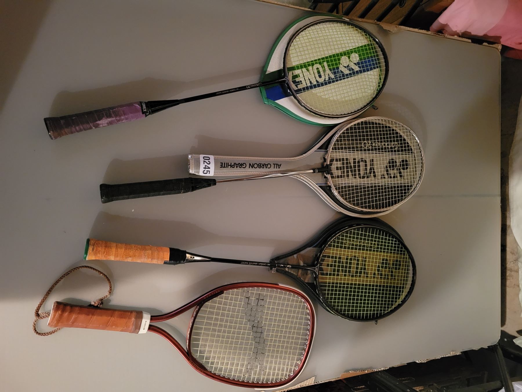 Three Badminton Rackets & Pickle Ball Racket - Beck Auctions Inc.