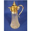 Image 1 : Silver topped decanter, 12'