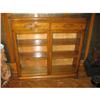 Image 1 : Glass door oak bookcase in Original varnish