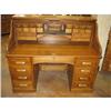 Image 1 : 60" Raised panel oak Roll top desk