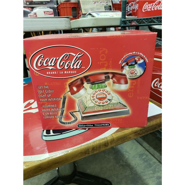 COCA COLA TELEPHONE . LIGHTS UP WITH CALL AND IS IN ORIGINAL PACKAGING