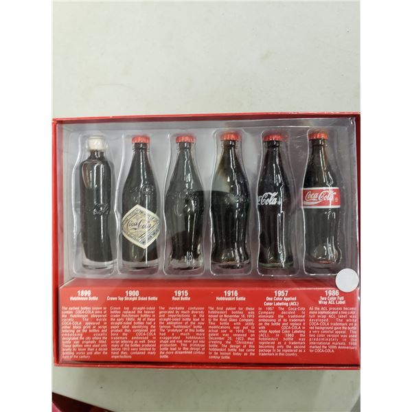 SIX MINI SAMPLES OF COCA COLA FROM 1899,1900,1915, 1916, 1957, 1986