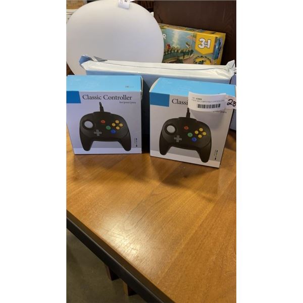 4 NEW N64 COMPATIBLE CONTROLLERS RETAIL$75