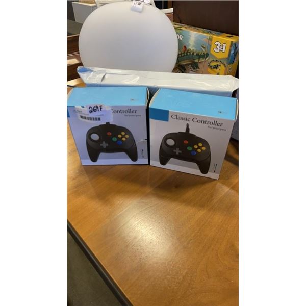 4 NEW N64 COMPATIBLE CONTROLLERS RETAIL$75