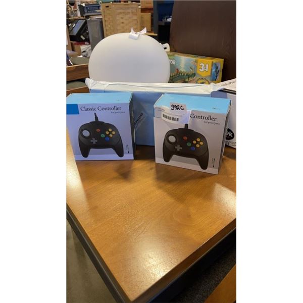 4 NEW N64 COMPATIBLE CONTROLLERS RETAIL$75