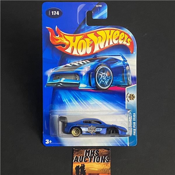 HOT WHEELS ROLL PATROL PIKES PEAK CELICA MISSING FRONT TIRES 1/64TH SCALE (ref1027)