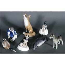 1 GROUP OF SEVEN PORCELAIN FIGURES including