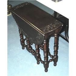 1 CARVED TUCKAWAY TABLE early 20th century  C