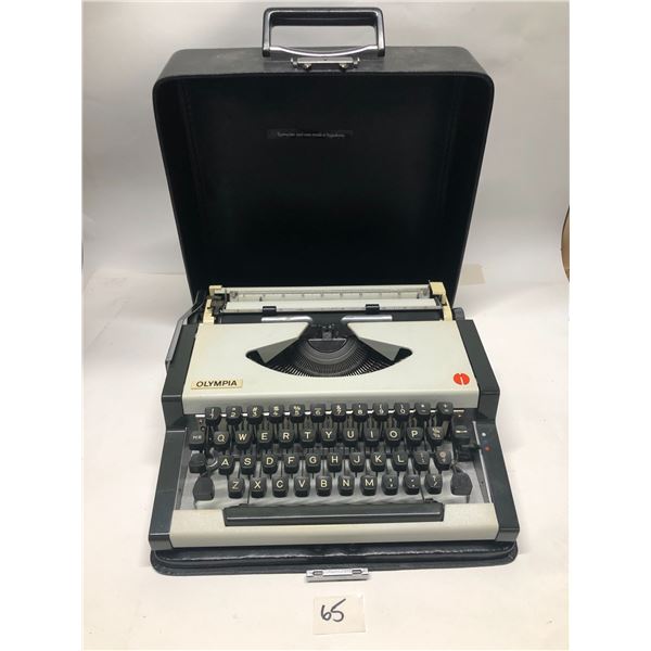 Olympia Typewriter with carrying Case - Yugoslavia