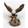 Image 2 : Eagle with 2 eaglets Ceramic Figurine