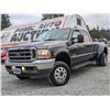 Image 2 : G1 --  2004 FORD F350 SRW SUPERDUTY EXT CAB 4X4 DUALLY, BLACK, 231,426 KMS