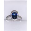 Image 2 : Blue Topaz Oval Cut Solitaire Ring 1.1 Carat Wt set in .925 silver and cluster stones surround size 