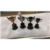 Image 1 : 4 VINTAGE TROPHIES - LATE 1940'S EARLY 50s 2 WITH BAKELITE BASES, 2 WITH WOOD BASES