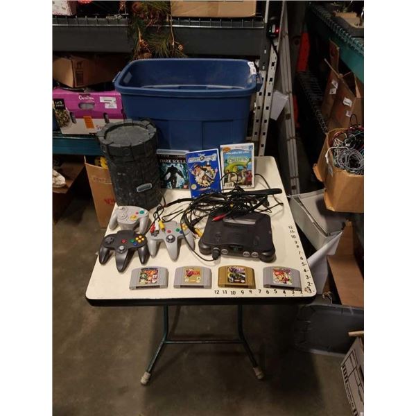 N64 CONSOLE WITH MARIO PARTY, LEGEND OF ZELDA MAJORAS MASK AND OCARINA OF TIME, BANKO KAZOOIE, 2 CON