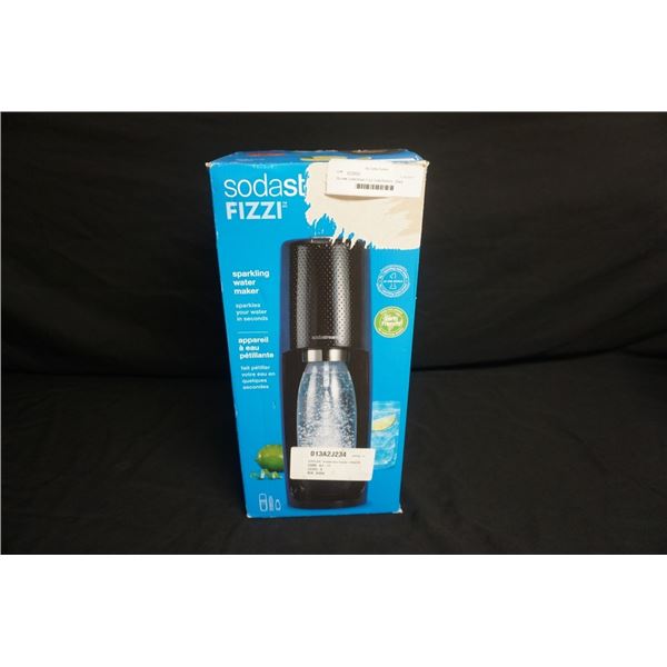 As new SodaStream Fizzi Soda Machine - Black has bottle no co2