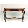 Image 1 : A MAHOGANY PARCEL-GILT CARVED CONSOLE TABLE