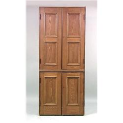 A CONTEMPORARY PINE ROUND-BACKED CORNER CUPBOARD