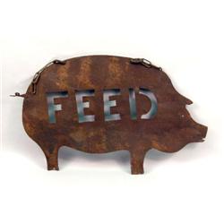 A PATINATED METAL PIG-FORM ADVERTISING SIGN