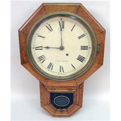 A SETH THOMAS OAK CASE REGULATOR WALL CLOCK
