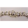 Image 4 : A 14K YELLOW GOLD AND DIAMOND "TENNIS" BRACELET