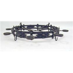 A LARGE WROUGHT-IRON CHANDELIER