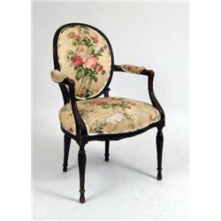 AN ENGLISH ADAM-STYLE CARVED ARMCHAIR