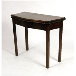 A SERPENTINE CHIPPENDALE CARD TABLE