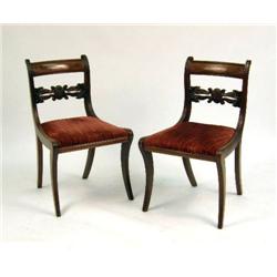 A PAIR OF EMPIRE SABRE LEG SIDE CHAIRS