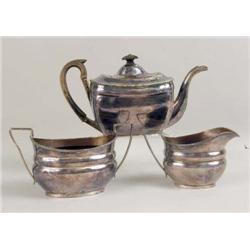 A SILVER PLATED TEAPOT, SUGAR, AND CREAMER