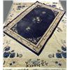 Image 1 : A CREAM-AND-BLUE CHINESE-STYLE WOOL RUG