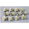 Image 1 : A SET OF TWELVE ROSE-SHAPED PORCELAIN CARD- OR MENU-HOLDERS