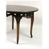 Image 2 : A CARVED MAHOGANY GRANITE-TOP TABLE