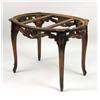 Image 7 : A CARVED MAHOGANY GRANITE-TOP TABLE