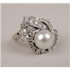Image 1 : A 14K WHITE GOLD, DIAMOND AND PEARL RING