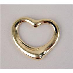 AN ELSA PERETTI FOR TIFFANY 18K YELLOW GOLD HEART PENDANT