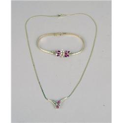 A 14K YELLOW GOLD, DIAMOND AND RUBY BRACELET